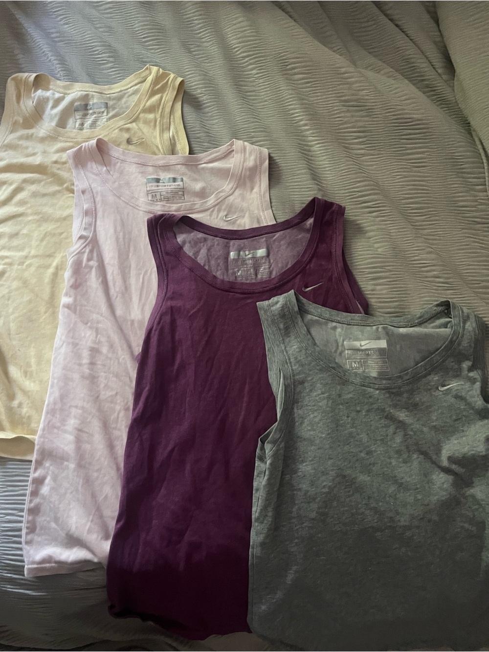 Nike Women’s Tank Tops in Cream, Light Pink, Plum & Heather Gray